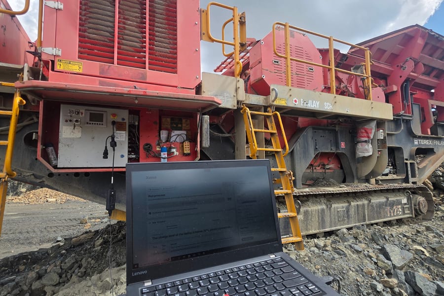 ECM remapping diagnostic laptop connected to diesel engine